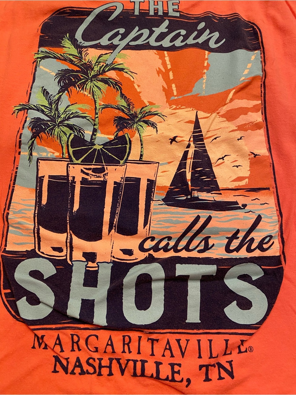 Margaritaville Coral or Orange Tropical Graphic Tee with Mint and Black Accents